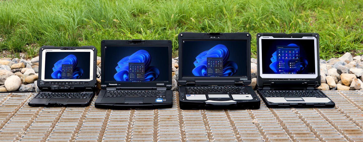 TOUGHBOOK product family sitting open on the ground outside