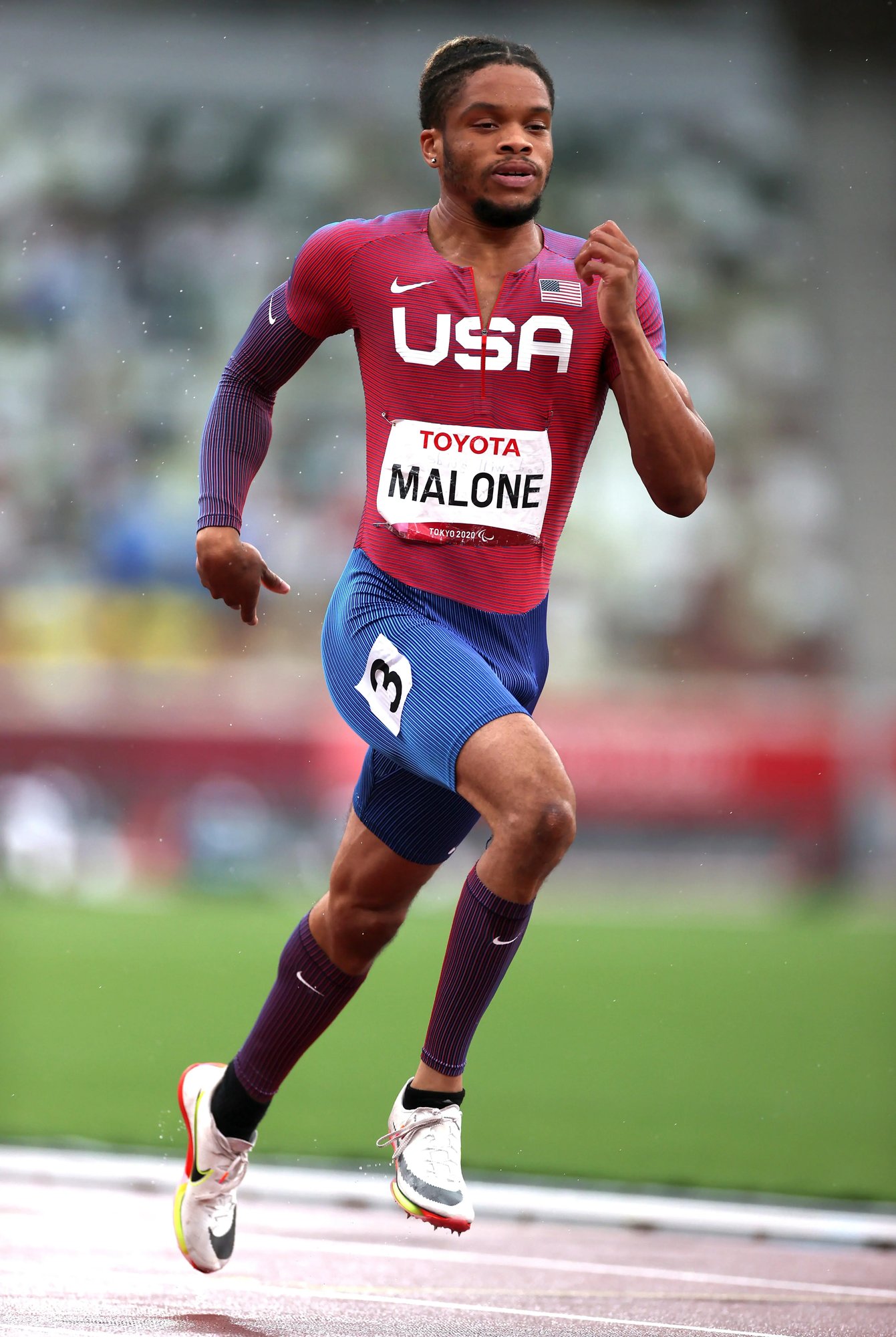 Noah Malone running sprints on a track