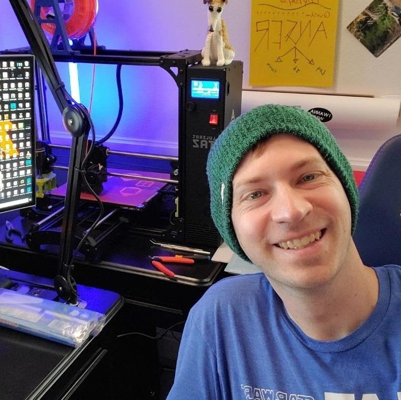 Scott S poses with his 3D printer