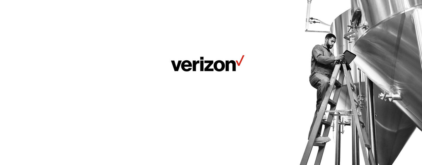 Verizon logo plus man on ladder next to tank with Panasonic TOUGHBOOK tablet