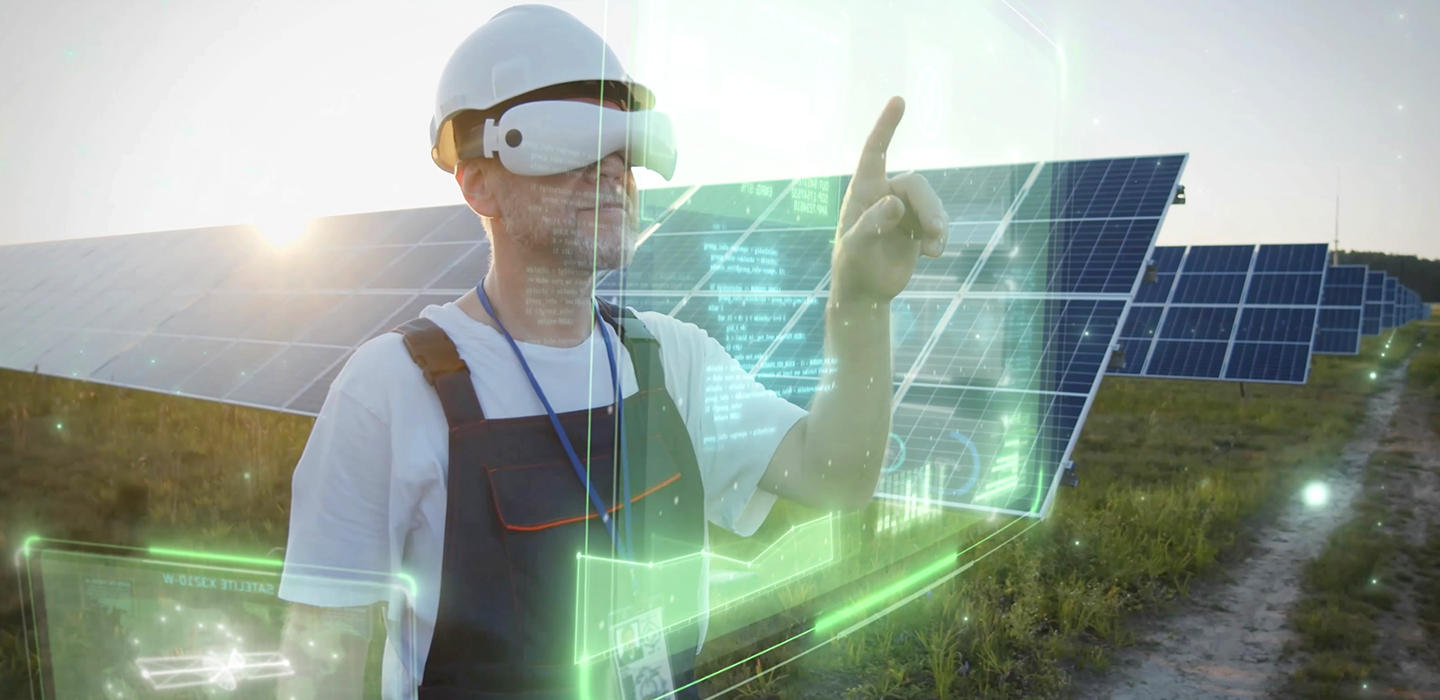 A concept image of a worker monitors solar panels using augmented reality imaging