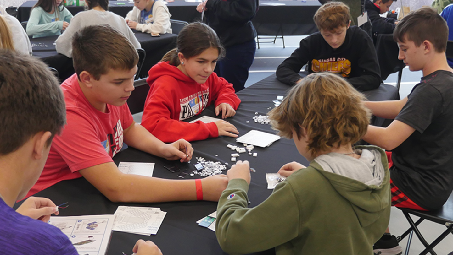 Students work on a group project at “A Space For All” STEM Fest in Kansas