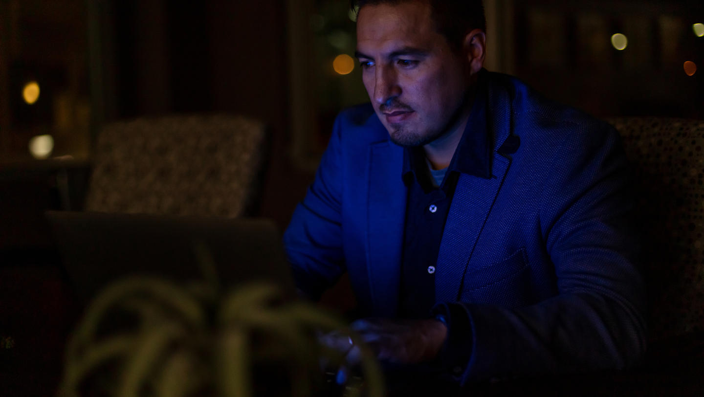 Adult Businessman Office Worker During Power Outage Working on Laptop On A Stormy Rainy Evening Photo Series