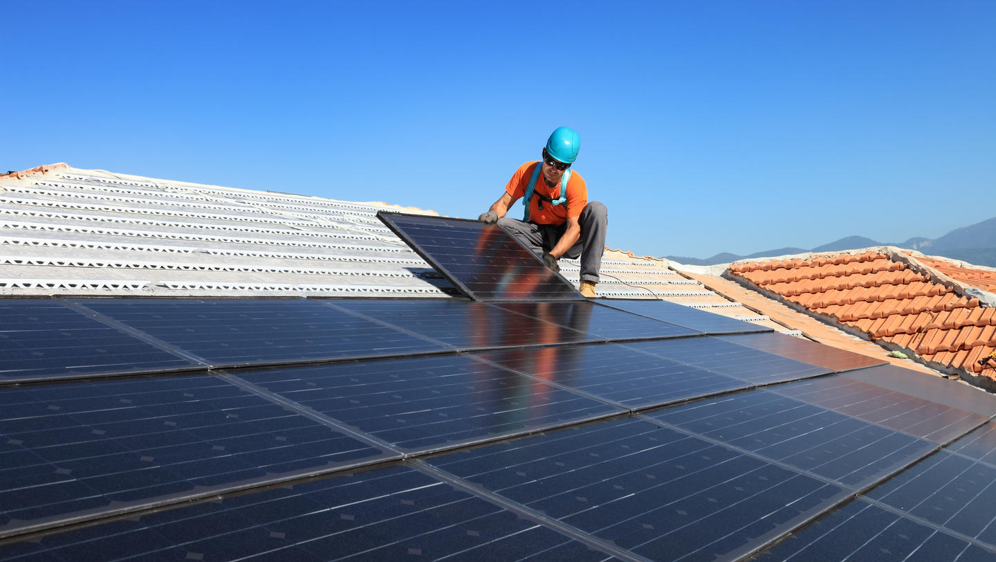 installing alternative energy photovoltaic solar panels