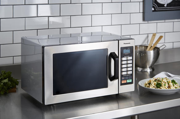 microwave on countertop with food