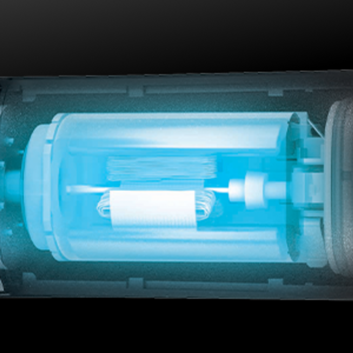 internal view of the ER-GN70-K trimmer's motor and battery design, highlighted with a light blue glow. 
