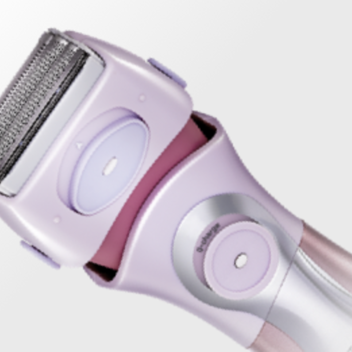 Close up of the ES2216PC electric shaver. Image is angled from top left to bottom right, the shaver's case is pink with dark ping accents. 