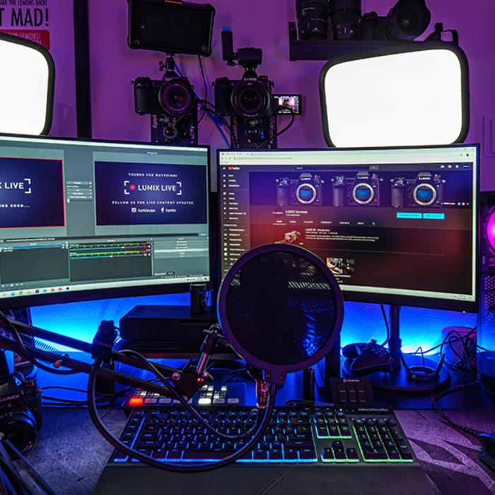 LUMIX Live (photo of a desk in purple lighting with a pro streaming setup)