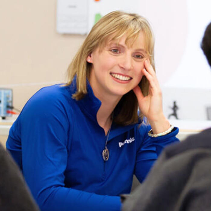 Katie Ledecky sits with students to discuss STEM education