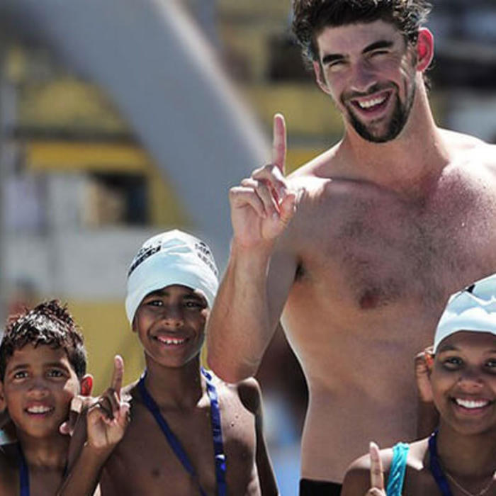 Michael Phelps teaches children swimming fundamentals