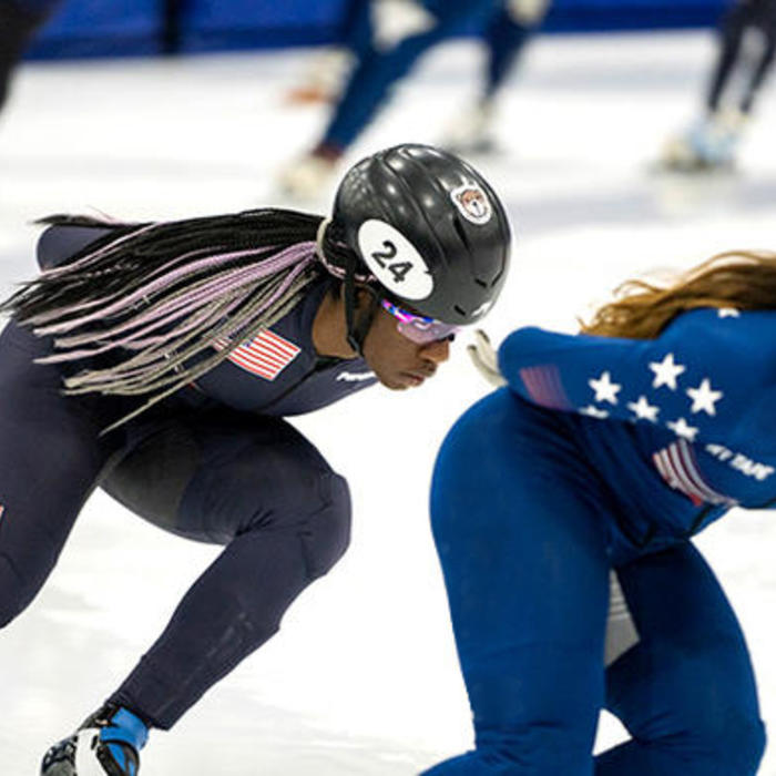 Maame Biney propels forward during a speed skating competition