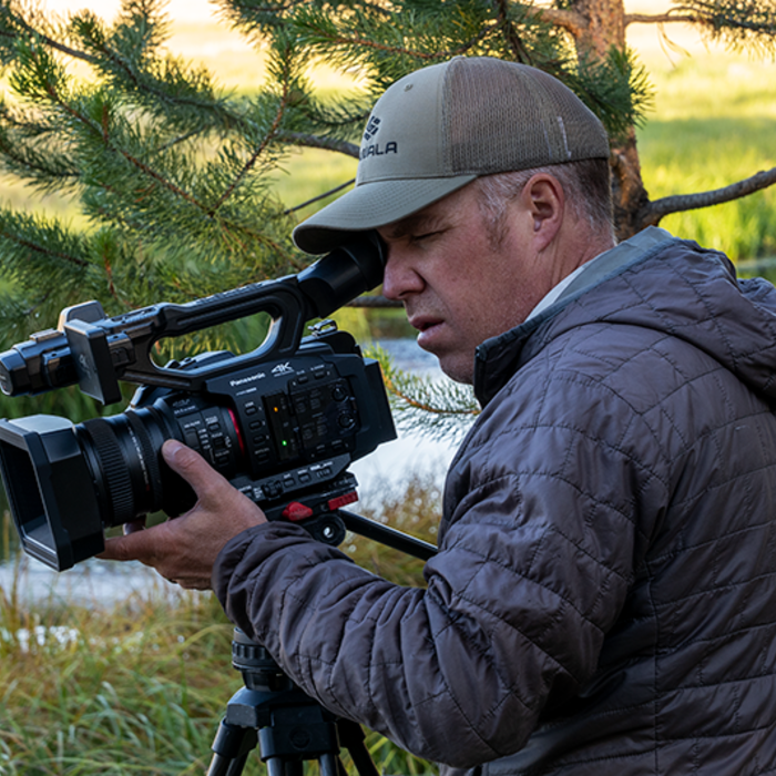 Todd Moen looks through the X2's viewfinder as he frames a shot