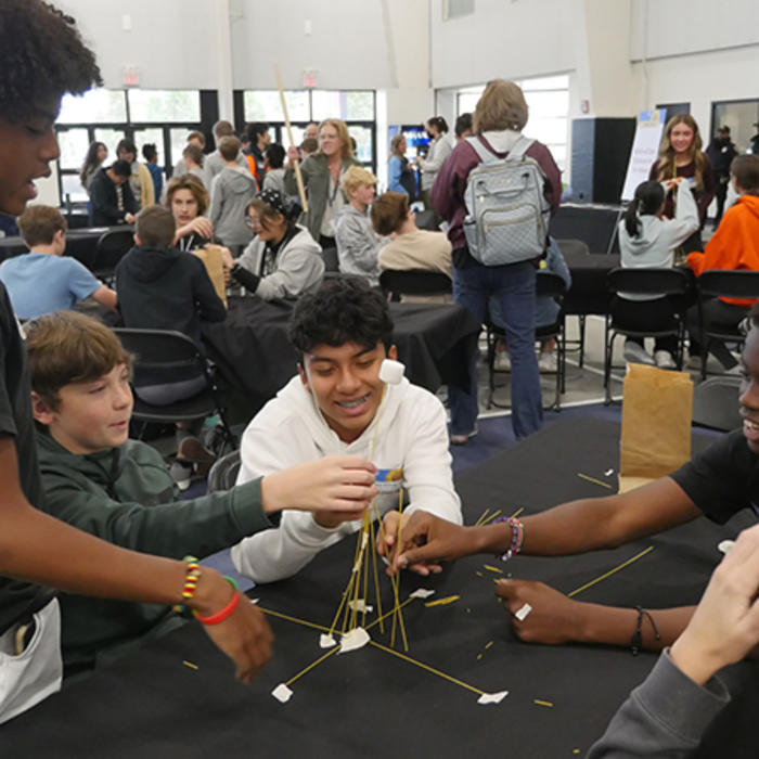 Students work together on a project at STEM Fest, a weekend of interactive experiences, educational activities, guest speakers and informational exhibits in Overland Park, KS