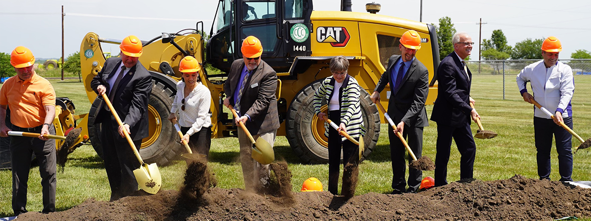 Panasonic Energy workers are joined Kansas Governor Laura Kelly, Senator Jerry Moran, Representative Sharice Davids and De Soto Mayor Rick Walker to break ground on the De Soto Local Road Improvements project