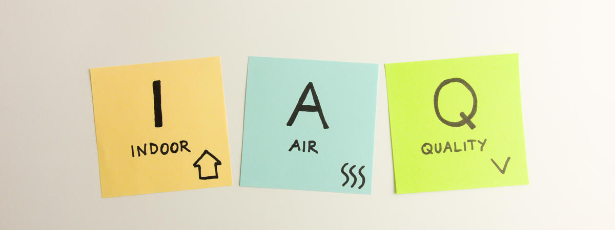 IAQ indoor air quality acronym handwritten on sticky notes